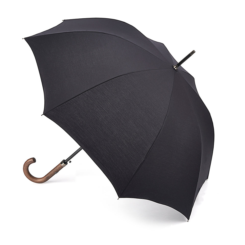 High performance luxury walking umbrella from Fulton in black with a wooden handle and lightweight, flexible, wind-resistant fibreglass frame.