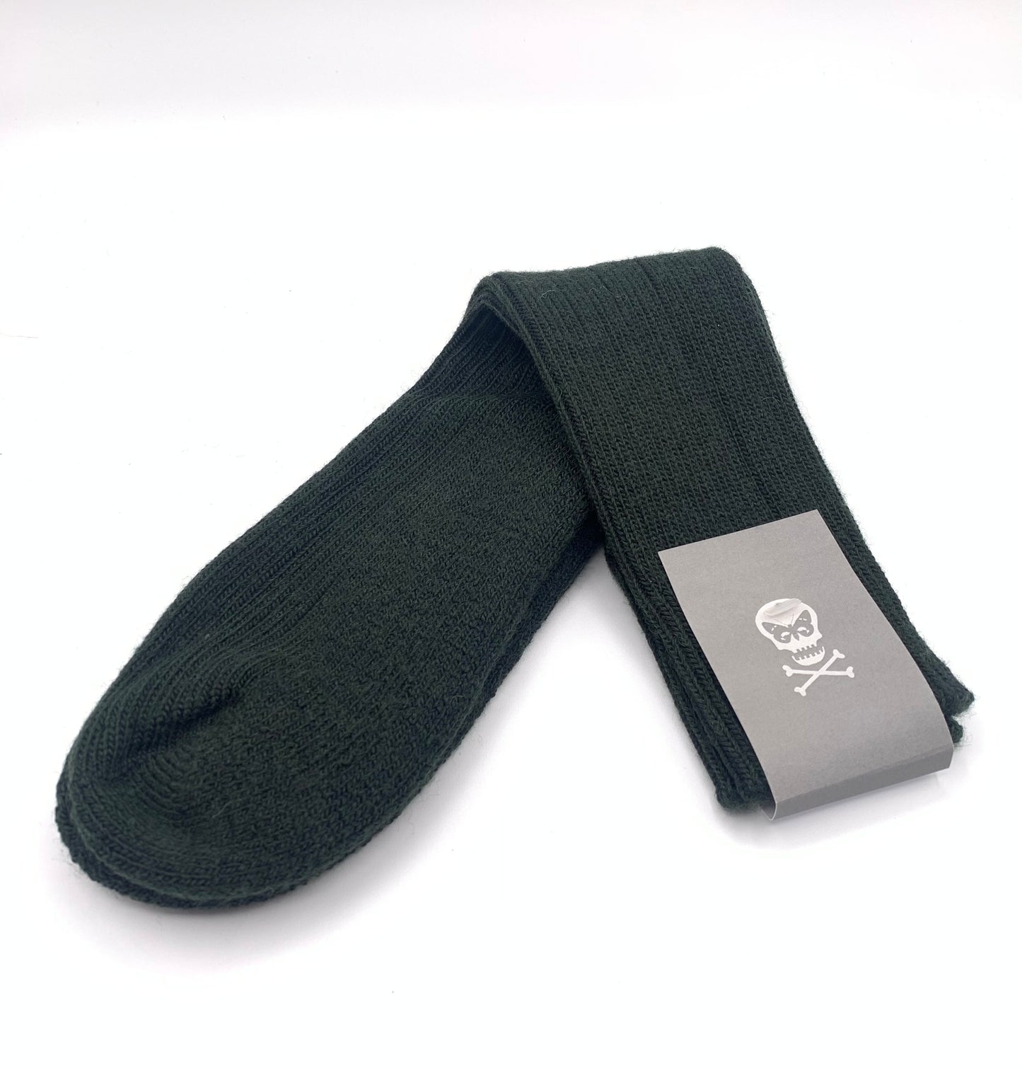 Padded woollen socks in deep green colour by unique contemporary luxury designer Regent, featuring padded heel and toe and natural moisture wicking properties.