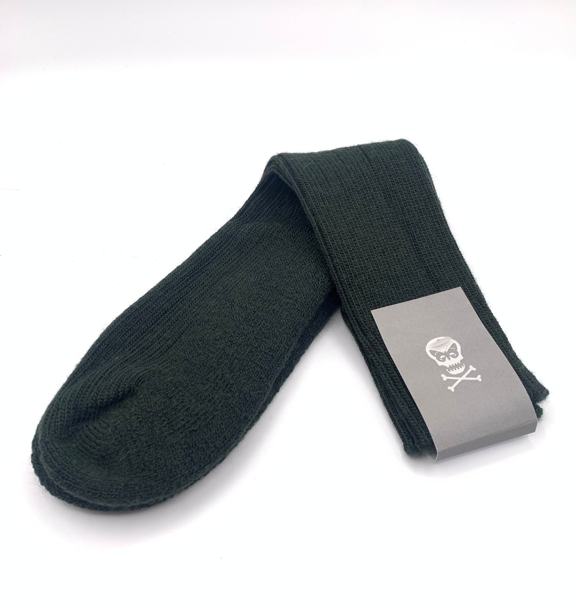 Padded woollen socks in deep green colour by unique contemporary luxury designer Regent, featuring padded heel and toe and natural moisture wicking properties.