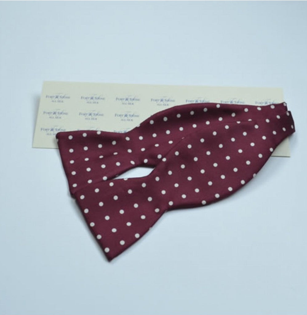 Self tie. Red spotted bow tie