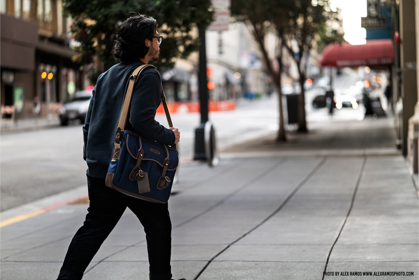 Briefcase with Laptop-Friendly design in navy from Great British travelware experts Billingham, featuring multiple interior organising pockets and 5-year guarantee. 
