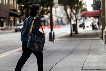 Briefcase with Laptop-Friendly design in navy from Great British travelware experts Billingham, featuring multiple interior organising pockets and 5-year guarantee. 