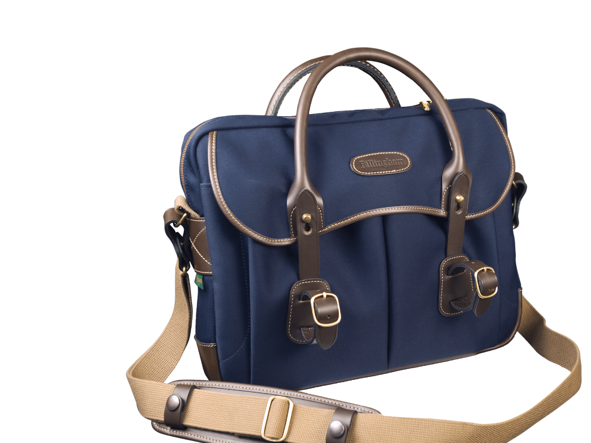 Briefcase with Laptop-Friendly design in navy from Great British travelware experts Billingham, featuring multiple interior organising pockets and 5-year guarantee. 