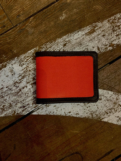 Bifold wallet in orange canvas and leather