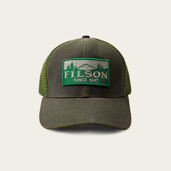 Filson Logger Hat, Filson Logo Patch Embroidered on the Front. Otter Green Colour, Wax Tin Cloth Front with an Mesh back. Adjustable Bronze Buckle Strap. 