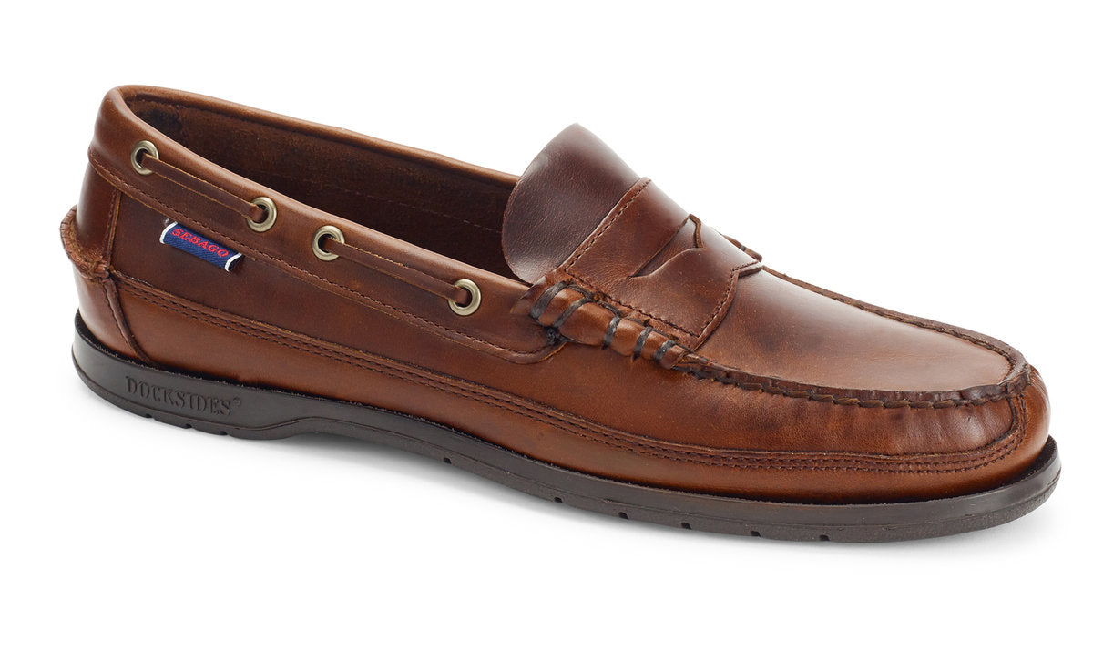 Brown leather loafers from original US boat shoe stylists Sebago, featuring handsewn construction, leather uppers, cushioned sock lining and brown leather construction.